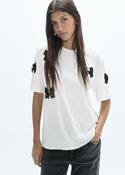 White T-Shirt with Black Embellished Bows image