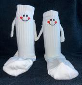 Hand holding socks image