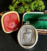 Dulce Periculum, Sweet Danger.  Antique wax letter seal featuring spurs, arrow and tiding boots.  Daredevil, fearless, adventure.