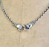 Clasped hands necklace.  Sterling silver, joined hands, 3mm sterling rolo chain in the length of your choosing image