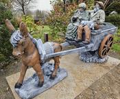 Donkey And Cart With Old Man And Woman